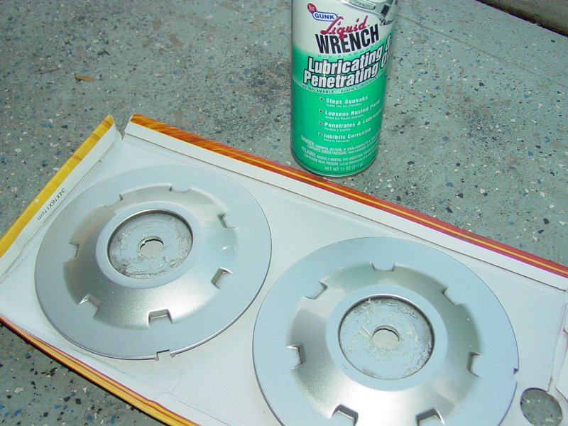 Cleaning glue from Center cap with lubricating and penetrating oil