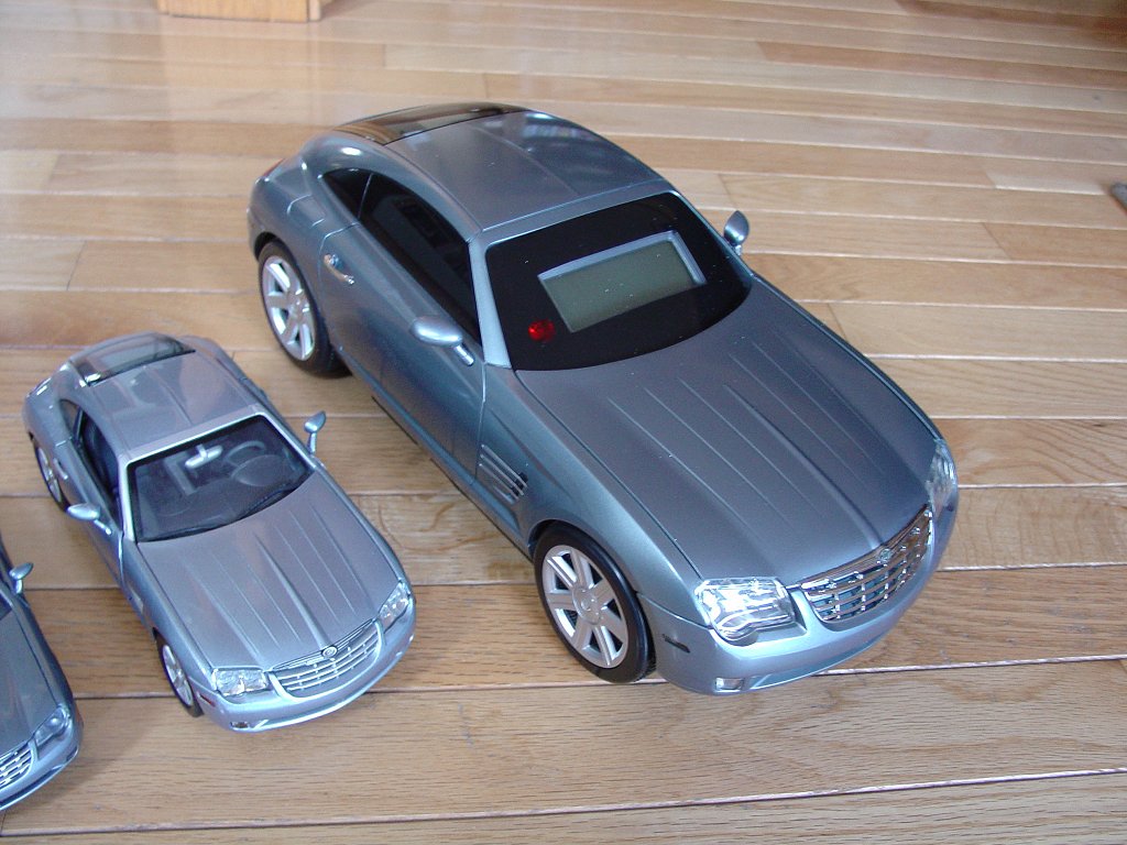 Motor Max 1-18 scale Chrysler Crossfire model with Chrysler Crossfire CD Stereo with AM/FM Tuner & Alarm Clock