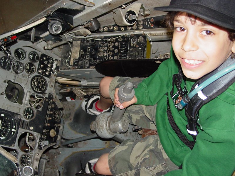 Tom in a Trainer aboard the USS Yorktown