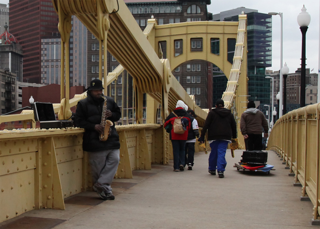 Click to Enlarge - Sax player on 6th Street Bridge
