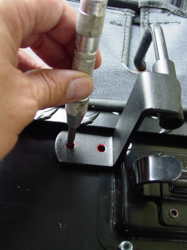 Marking for drilling with center punch - Click to Enlarge