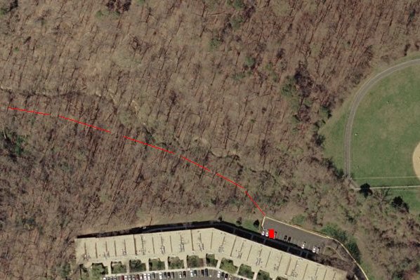Aerial View of parking area and trail (red)