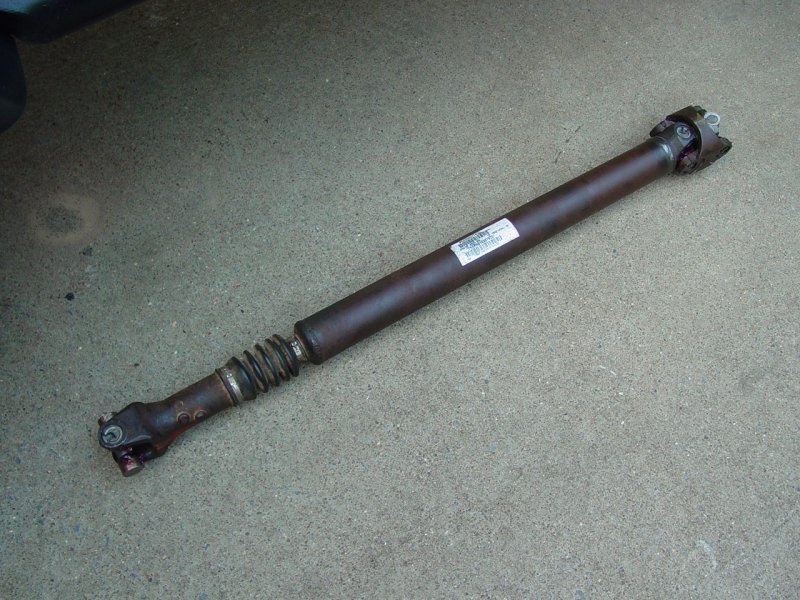 Rebuilt drive shaft with u-joints installed