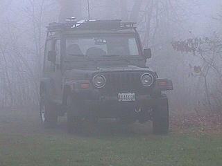 Jeeps in the mist
