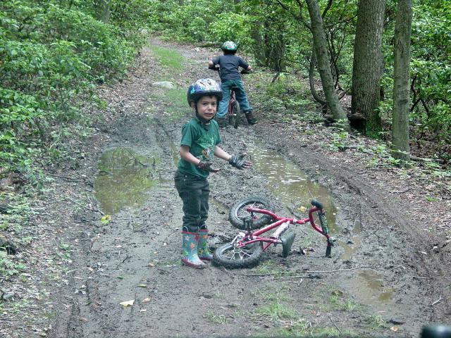 Tom falls in the mud